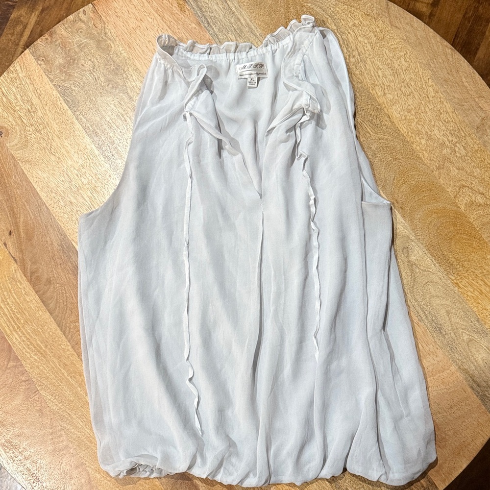 Elegant Cream Sleeveless Blouse